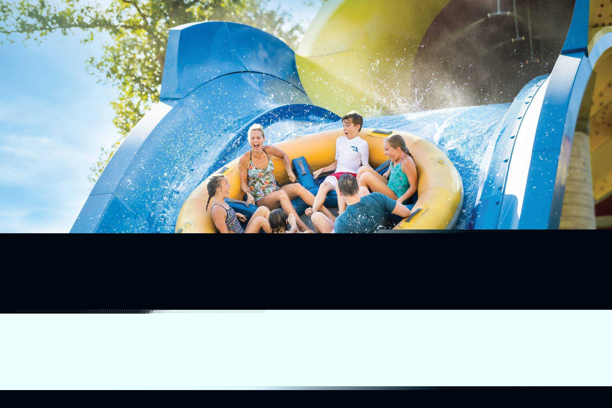 Family screaming while going down the steepest drop of Mammoth Water Coaster at Holiday World & Splashin' Safari in Santa Claus, Indiana
