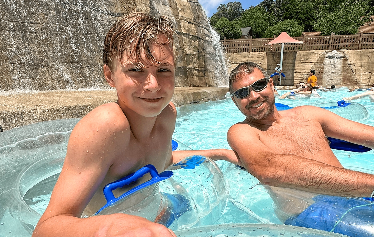A father and son float along the Bahari River lazy river at Holiday World & Splashin' Safari in Santa Claus, Indiana.