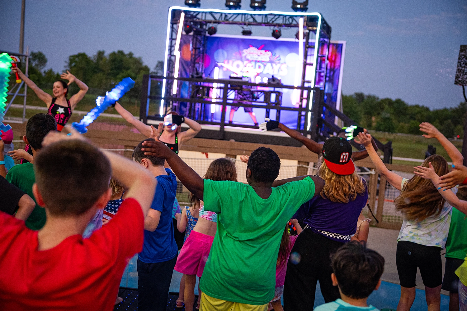 Guests enjoying Light the Night DJ Dance Party prior to Holidays in the Sky.