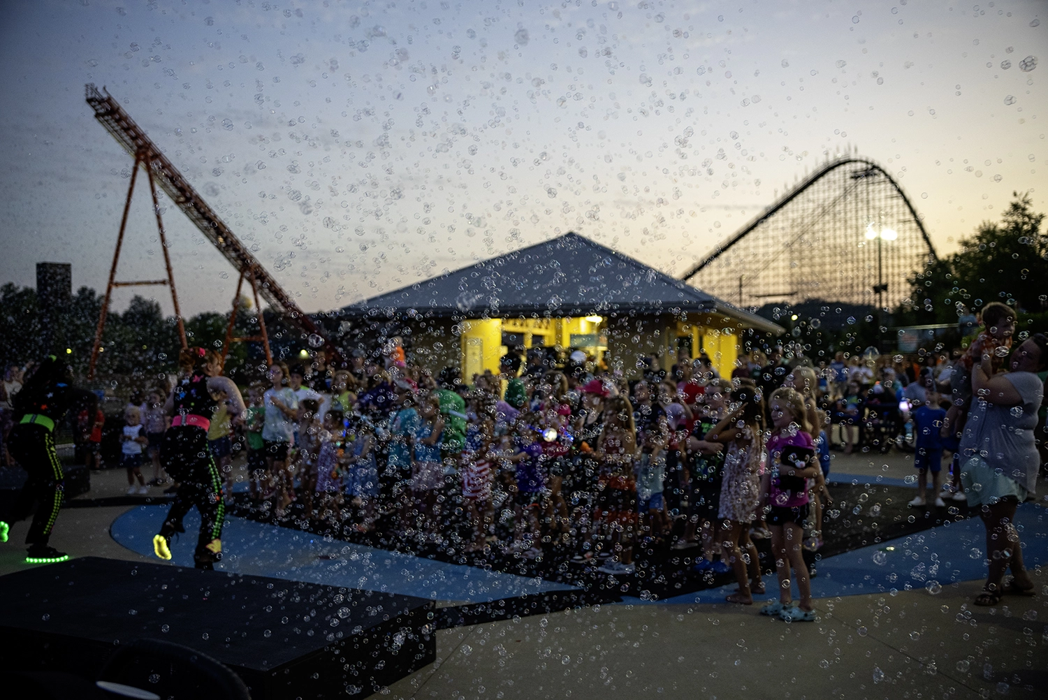 Guests enjoying Light the Night DJ Dance Party prior to Holidays in the Sky.