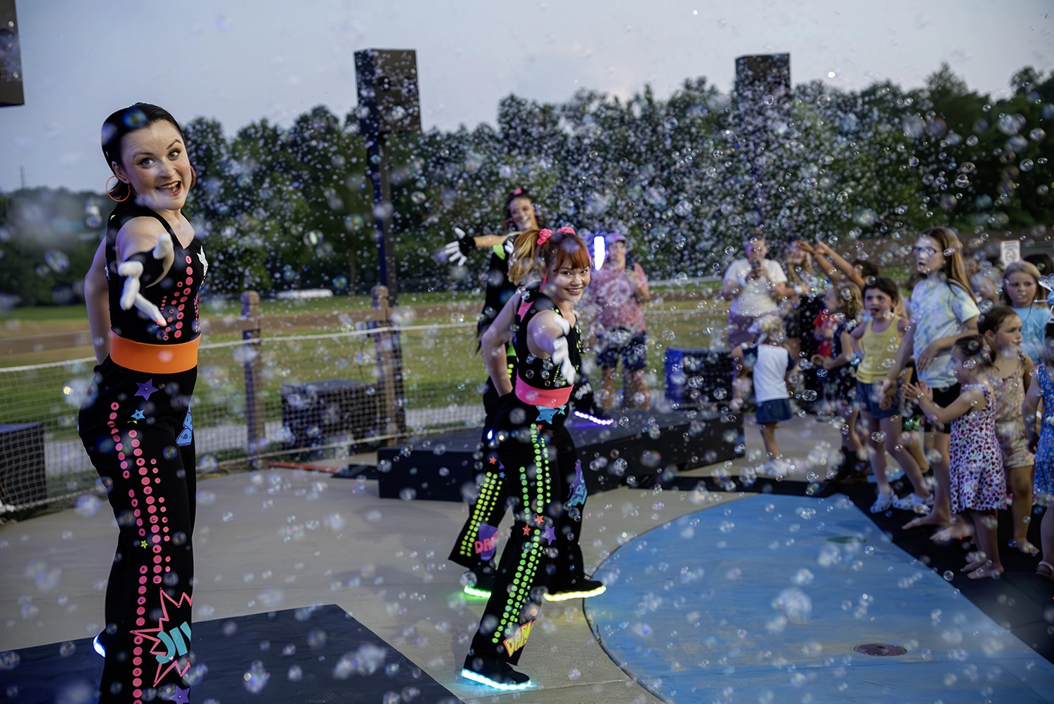 Guests enjoying Light the Night DJ Dance Party prior to Holidays in the Sky.