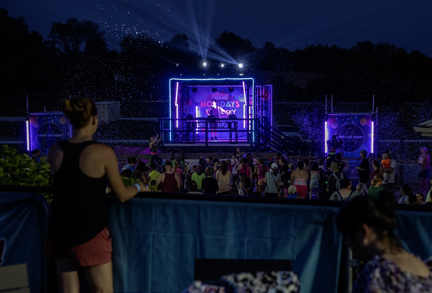Guests enjoying Light the Night DJ Dance Party prior to Holidays in the Sky.