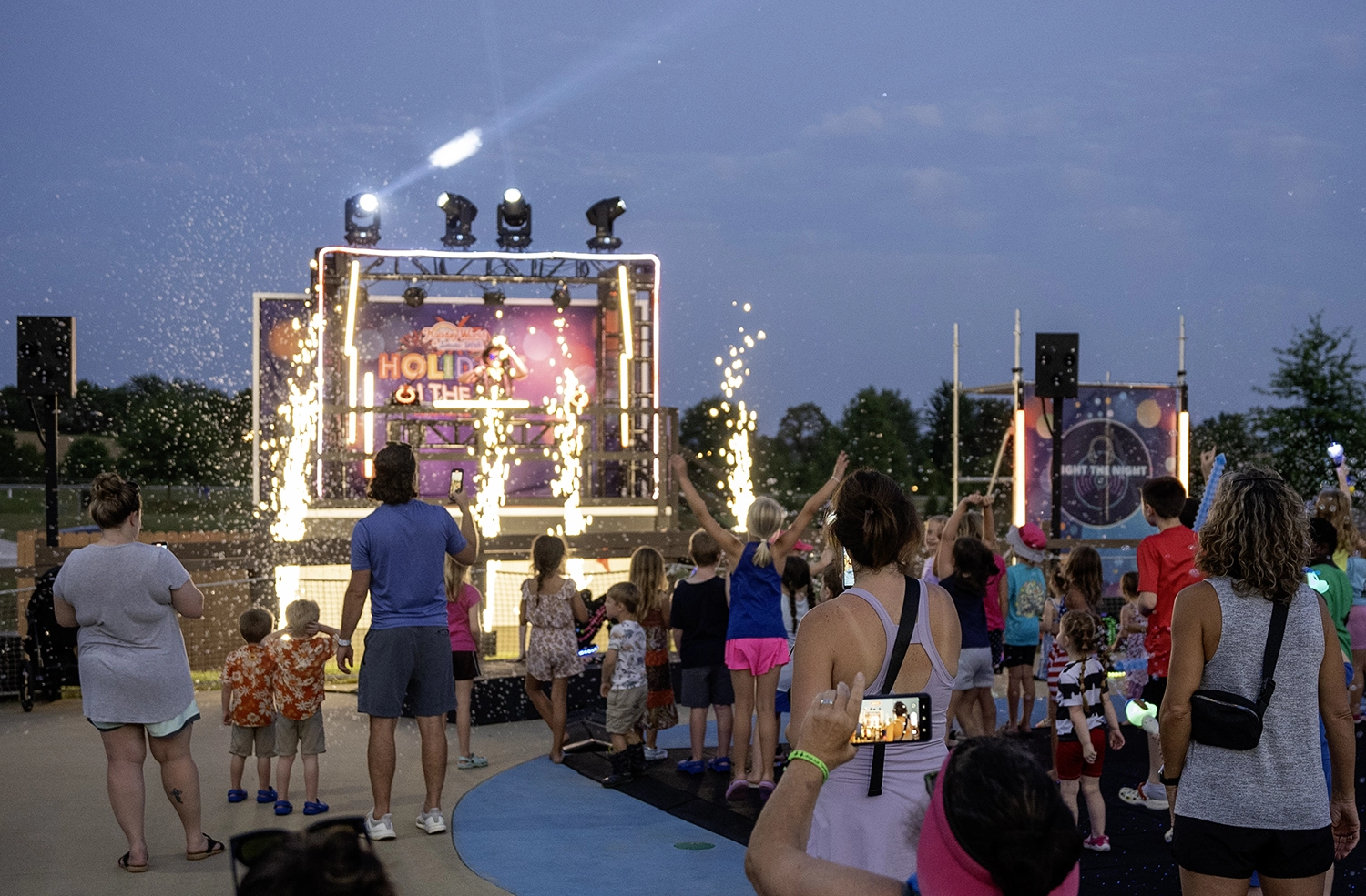 Guests enjoying Light the Night DJ Dance Party prior to Holidays in the Sky.