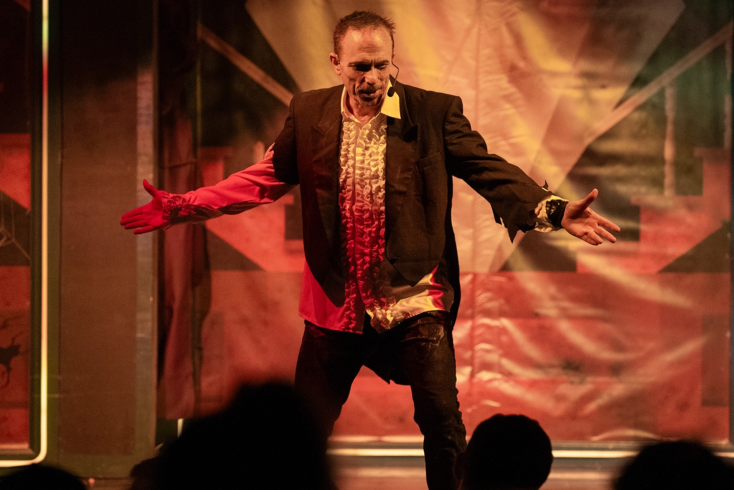 The magician, Don Baggett, speaking to the crowd during Magic of the Night at Holiday World's Friday Night Live!