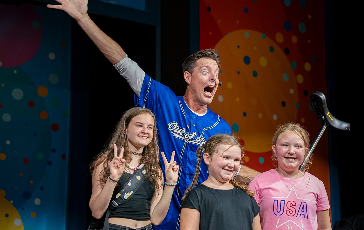 Posing for pictures with Matt Jergens after the Out of Hand Comedy Juggling Show at Holiday World.