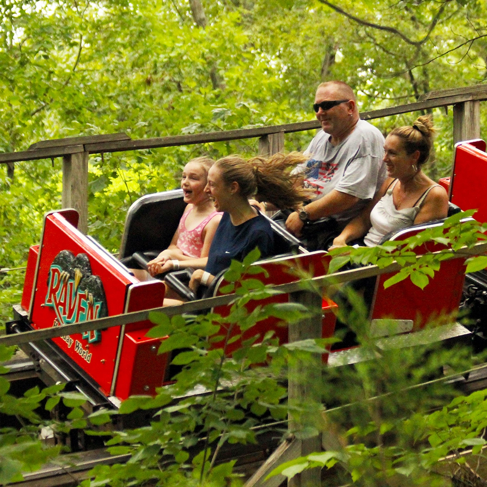 A family zooming by on The Raven at Holiday World & Splashin' Safari in Santa Claus, Indiana
