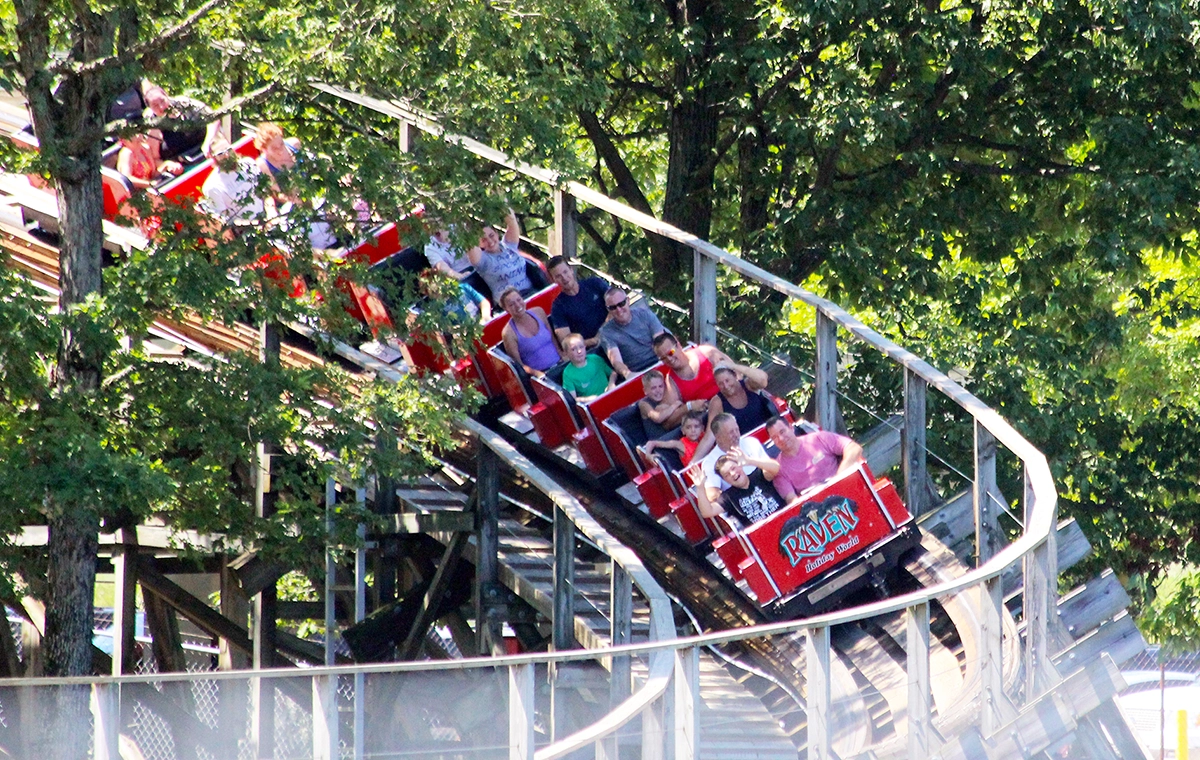 A train leading into a curve on The Raven at Holiday World & Splashin' Safari in Santa Claus, Indiana
