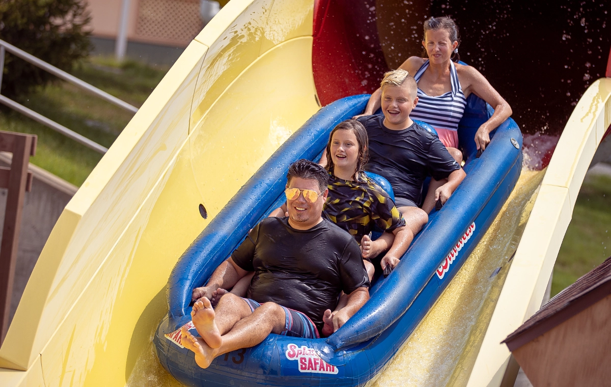 Family splashing down at the end of Wildebeest Water Coaster at Holiday World & Splashin' Safari in Santa Claus, Indiana
